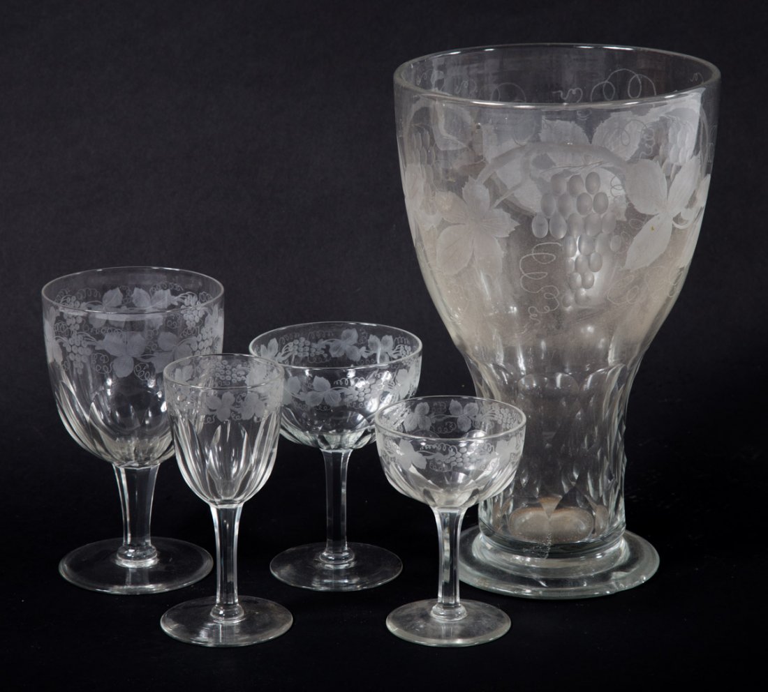 46 pieces of etched clear Bohemian stemware: comprising: 8 water goblets, 11 champagnes, 7 wine glasses, 10 sherries, 8 ports, 2 stem cordials, and ice cooler, all with acid etched grapevine decoration