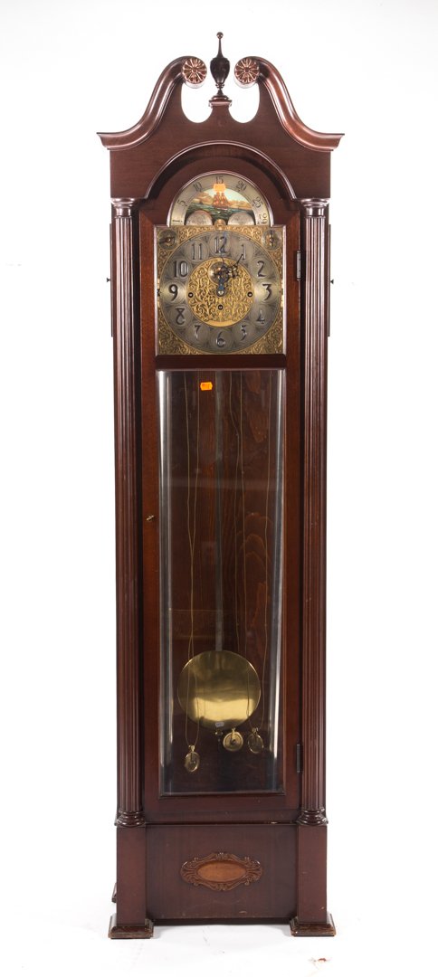 Neoclassical style mahogany tall-case clock: first half-20th century; mahogany case with glass panel door and sides, chimes and moon phase dial, 80 in. H.