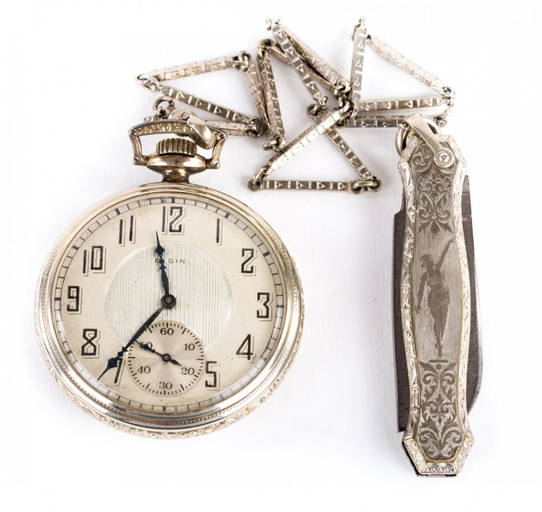 An Elgin Pocket Watch With Chain And Knife