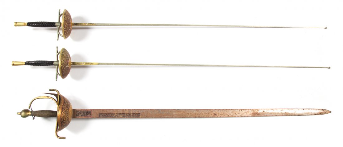 Three European decorative swords: two fencing swords and one cutlass