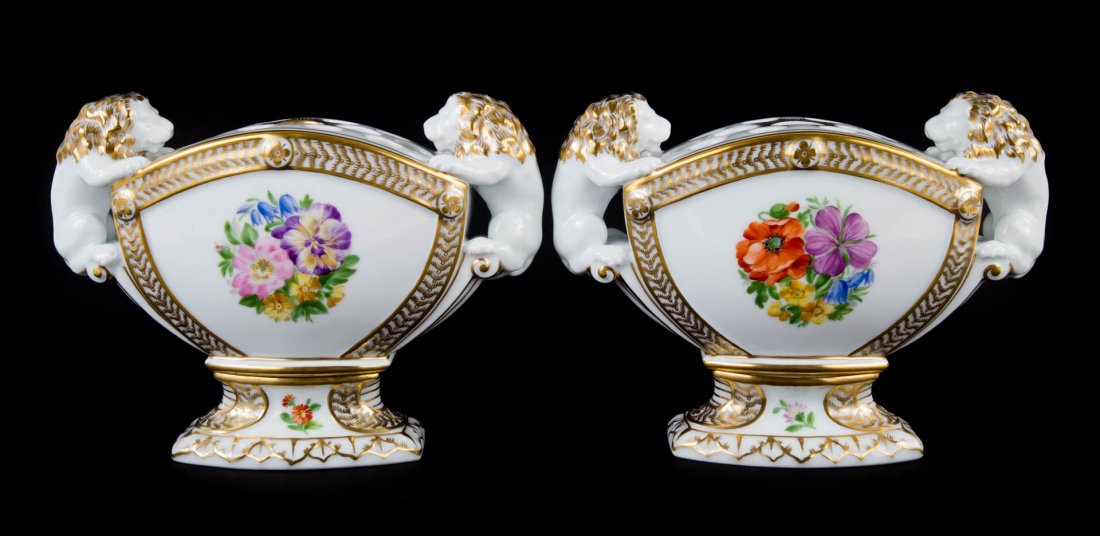 Pair Royal Copenhagen porcelain bough pots: lion-form handles, floral and gilt decoration, 7 in. H.