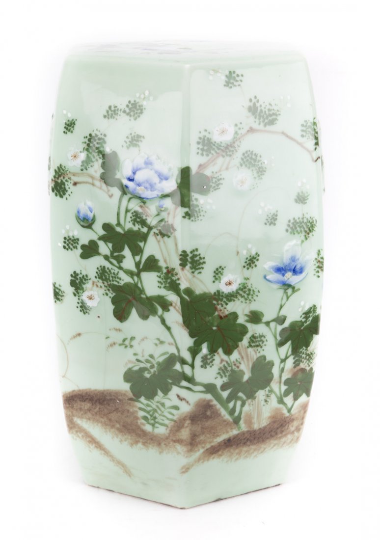 Japanese celadon porcelain garden seat: early 20th century; hexagonal form with floral decoration, 19 in. H., 11 in. Diam.