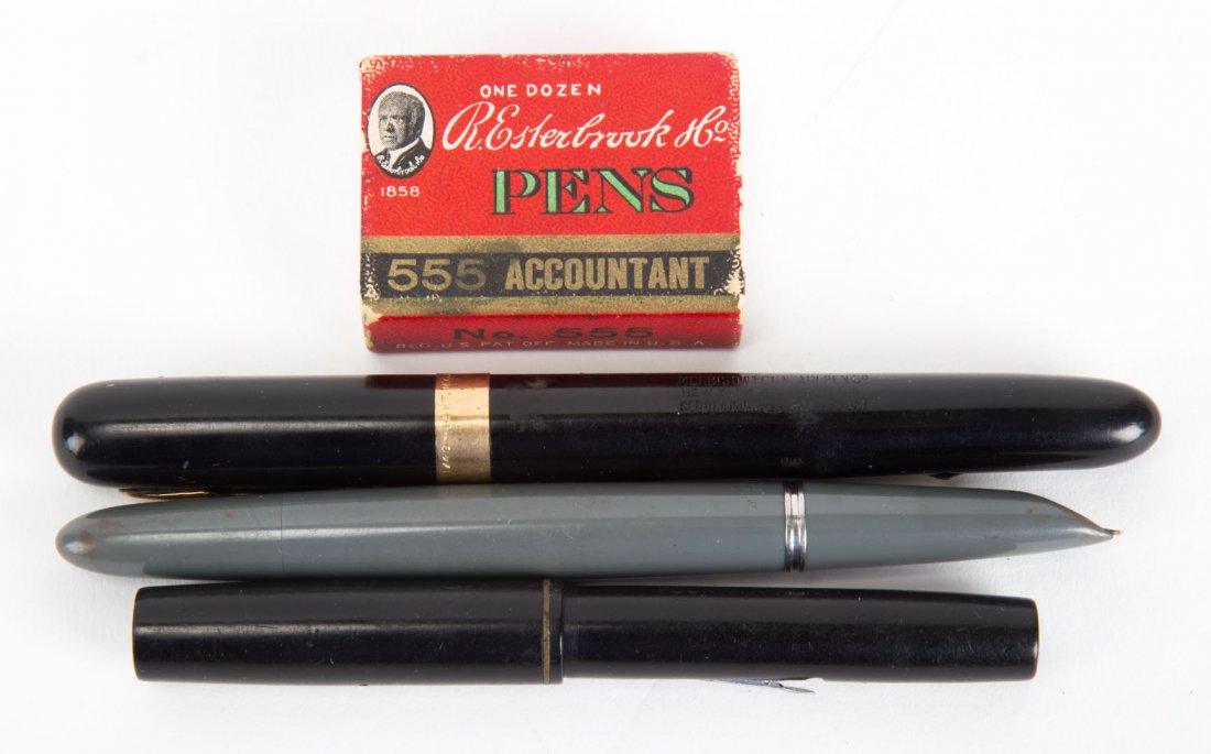 Three fountain pens: including: Waterman, pen with 14K gold nib, and a Parker 51 with a box of extra nibs