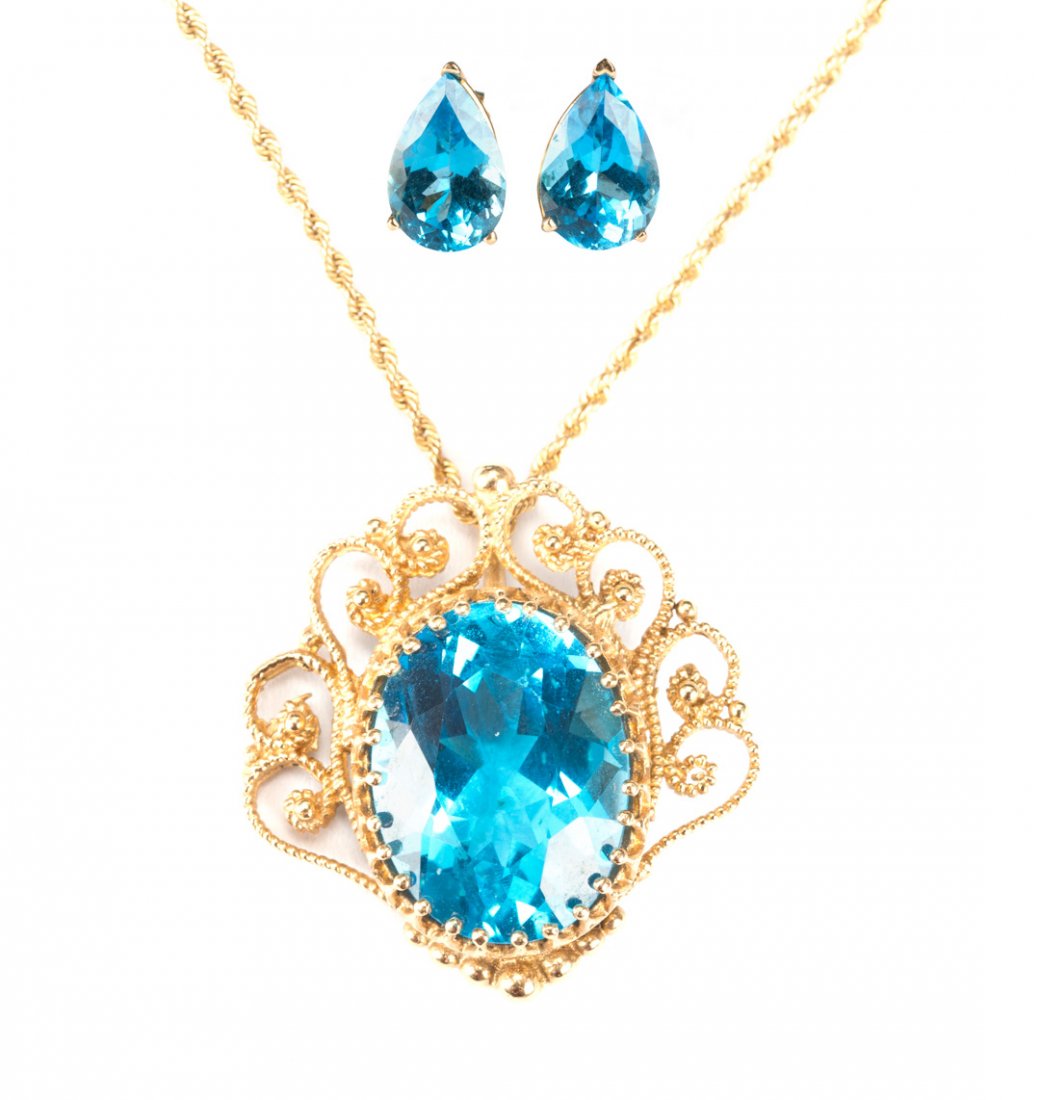 A Gold Blue Topaz Pendant and Earring Set (1 of 7)