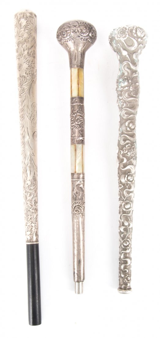 Three weighted sterling silver umbrella handles (1 of 6)