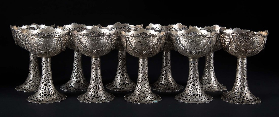 German openworked silver parfait cup holders: B. Neresheimer & Son, Hanau, circa 1900, 5 1/4 in. H., 35.35 ozt. t.w.