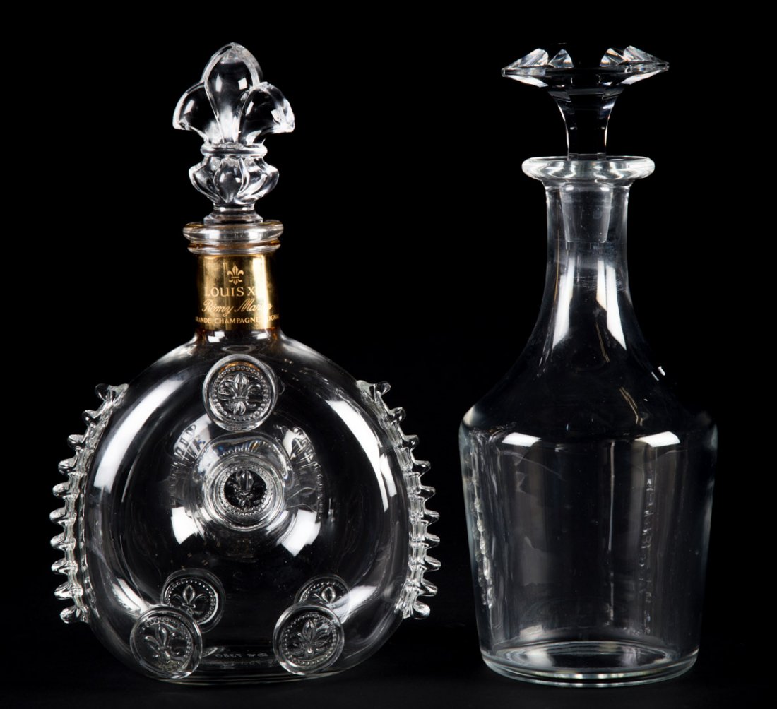 Baccarat crystal Remy Martin bottle and decanter: Remy Martin Louis XIII cognac bottle with acid etched mark, 11 in. H. and a decanter with acid etched mark, 11 in. H.