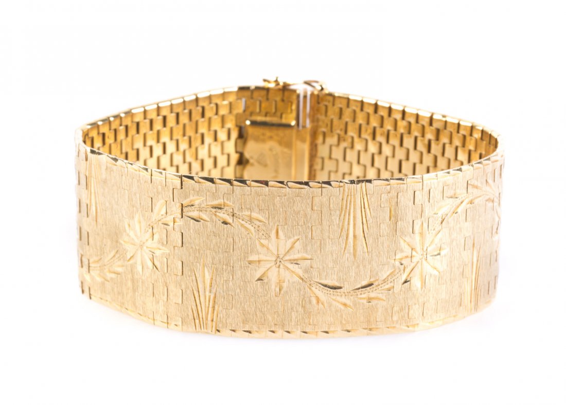 A Wide Floral Engraved Bracelet in 18K Gold (1 of 3)