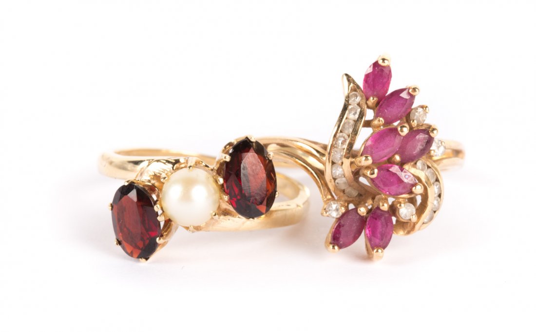 A Pair of Lady's Gold Bypass Gemstone Rings (1 of 5)