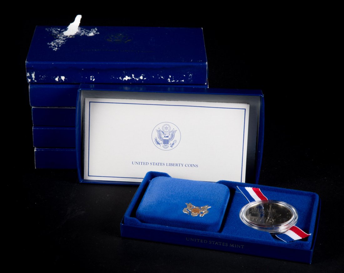 [US] 6- 1987 Statue of Liberty silver dollars: In original mint boxes with COAs; each is .77 ozt silver proofs