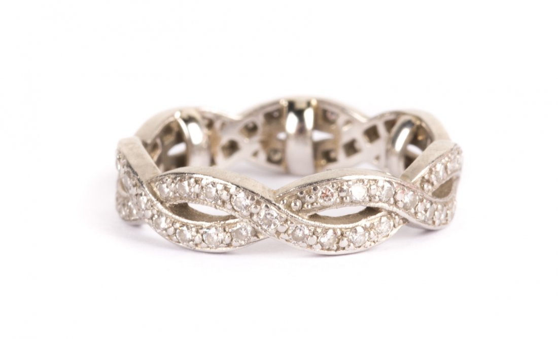 A Lady's Diamond and Platinum Wedding Band (1 of 4)