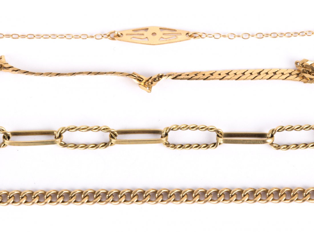 Four Lady's Link Bracelets in Gold: 1) 14K yellow gold station bracelet 2) 14K yellow gold herringbone bracelet 3) 10K yellow gold alternating rope link bracelet, 4) 10K traditional curb link bracelet, 10 grams tw