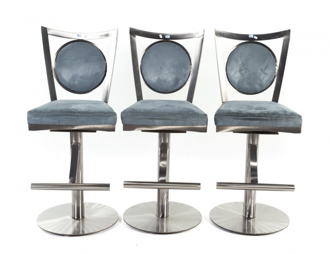 Three stainless steel swivel counter stools (1 of 2)
