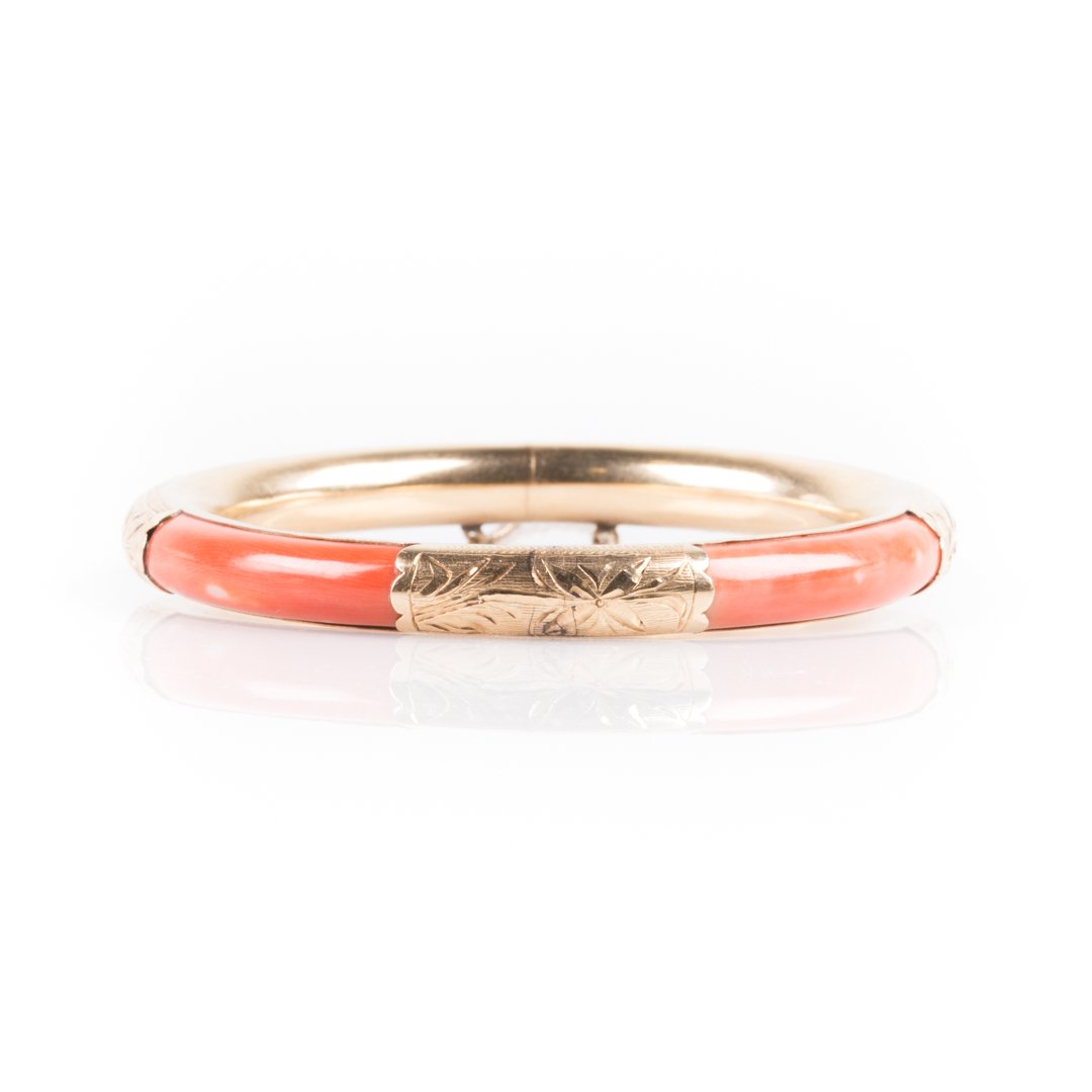 A Lady's Gold Coral Bangle Bracelet (1 of 4)