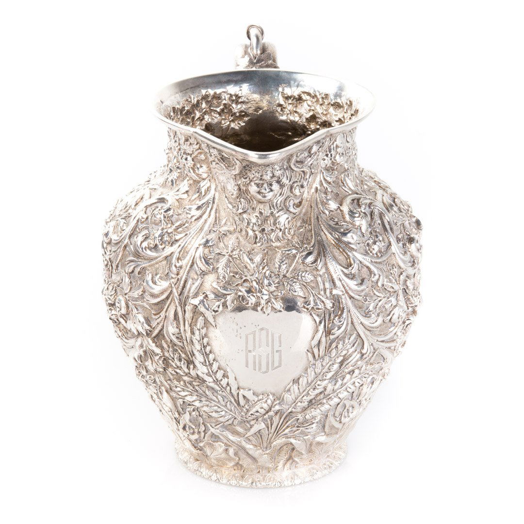 Beautiful Kirk repousse coin silver water pitcher (1 of 7)