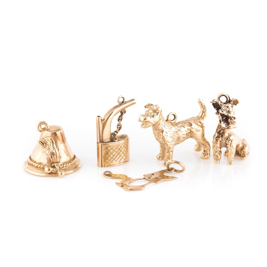A Collection of Five Charms in 14K Gold (1 of 5)