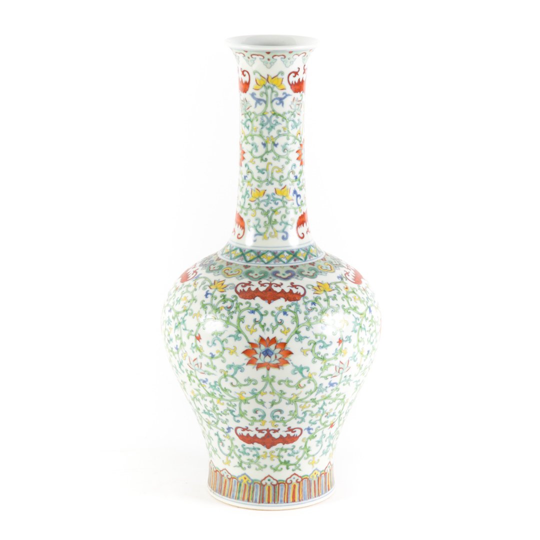 Chinese Wucai porcelain vase: floral and bat decoration with character mark underneath, 15 in. H.