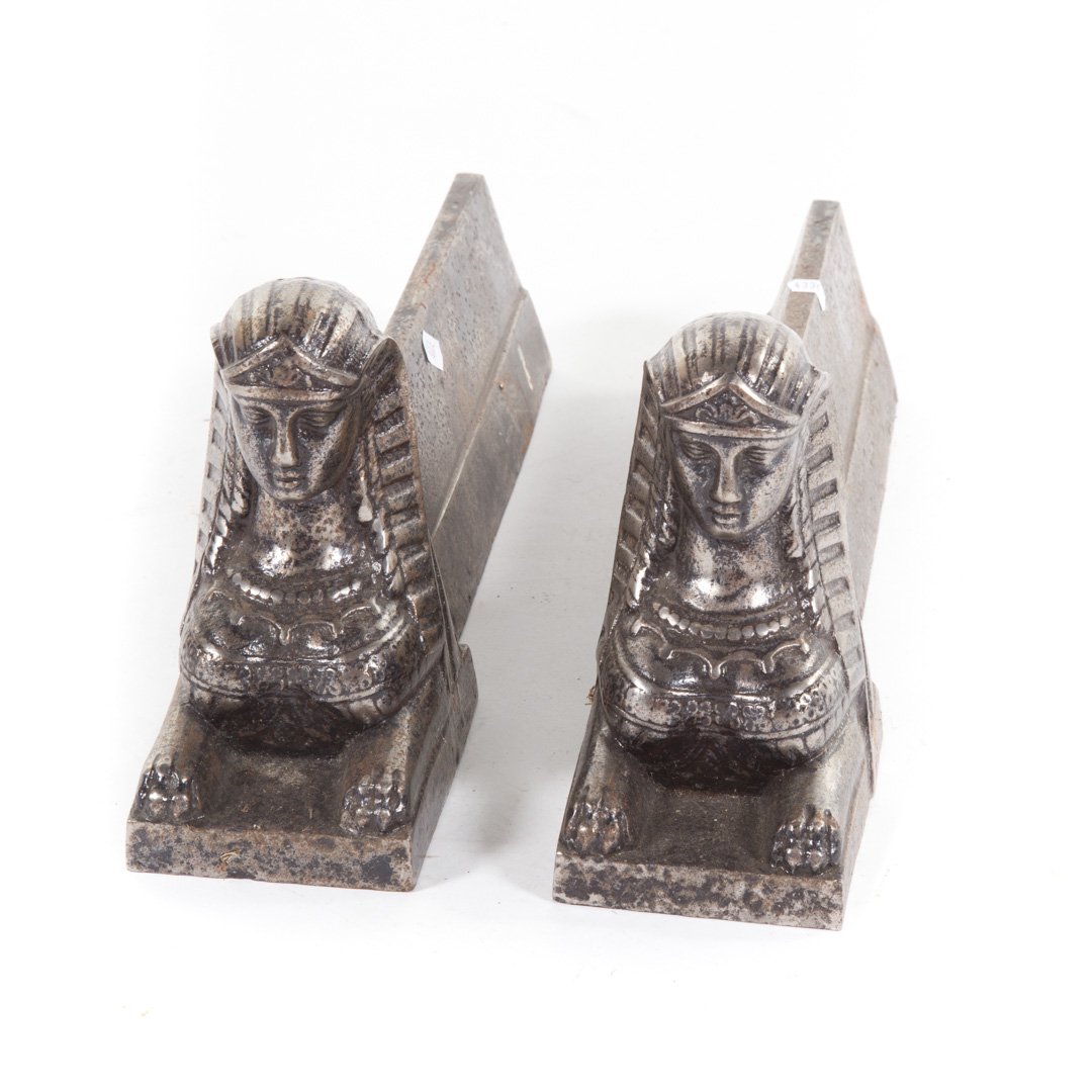 Pair of Egyptian Revival style sphinx chenets (1 of 2)