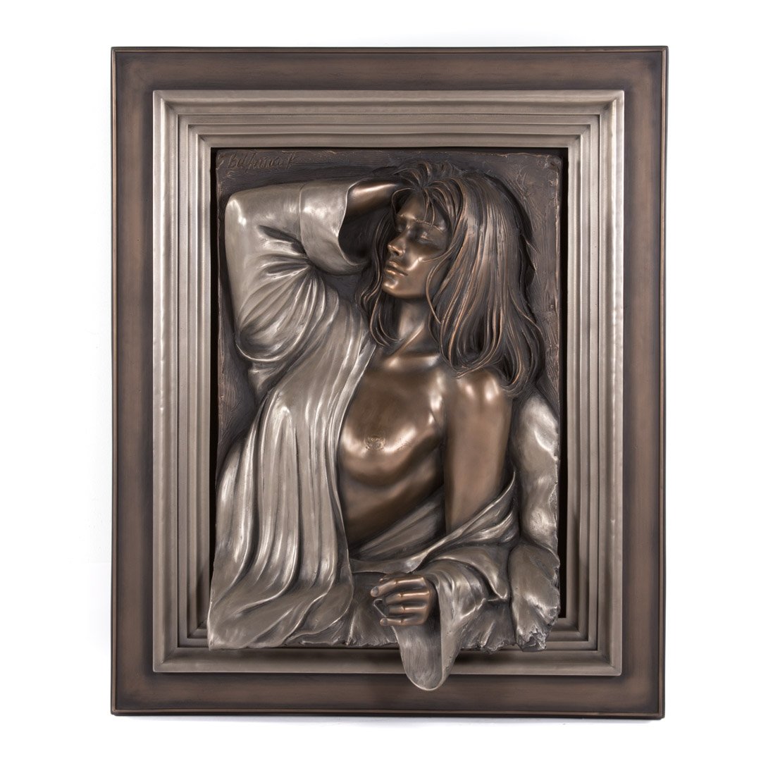 Bill Mack. Bas relief sculpture: (American, b. 1949). Bronzed resin of female nude, signed ul, in painted and silver wood frame, 26 1/2 in. H., 19 1/2 in. W.