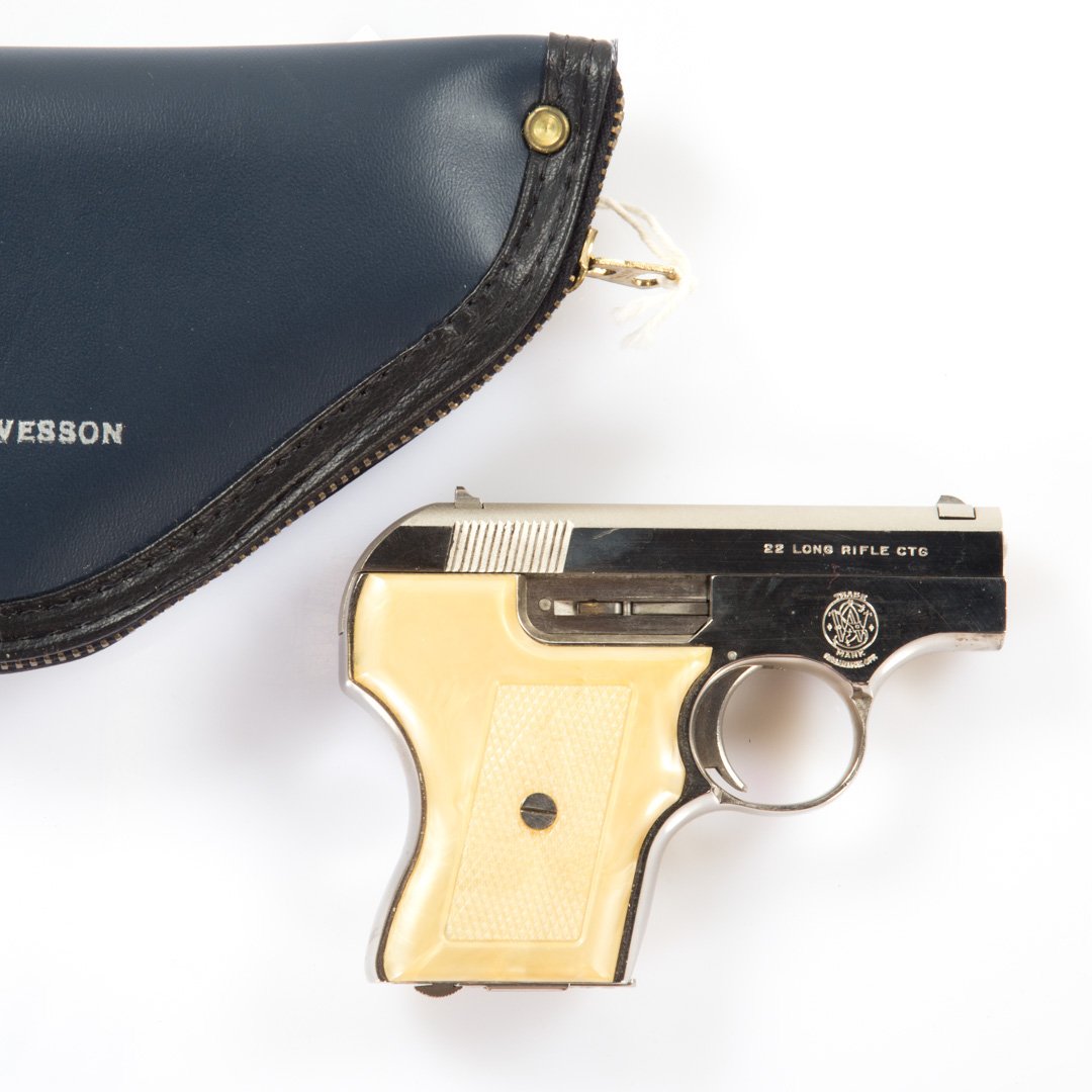 Smith & Wesson 22 cal. pocket pistol: Escort model 61-2 semi-automatic pocket pistol, comes with original box, owners manual, soft case, one magazine and cleaning brush, Serial #: B31527
