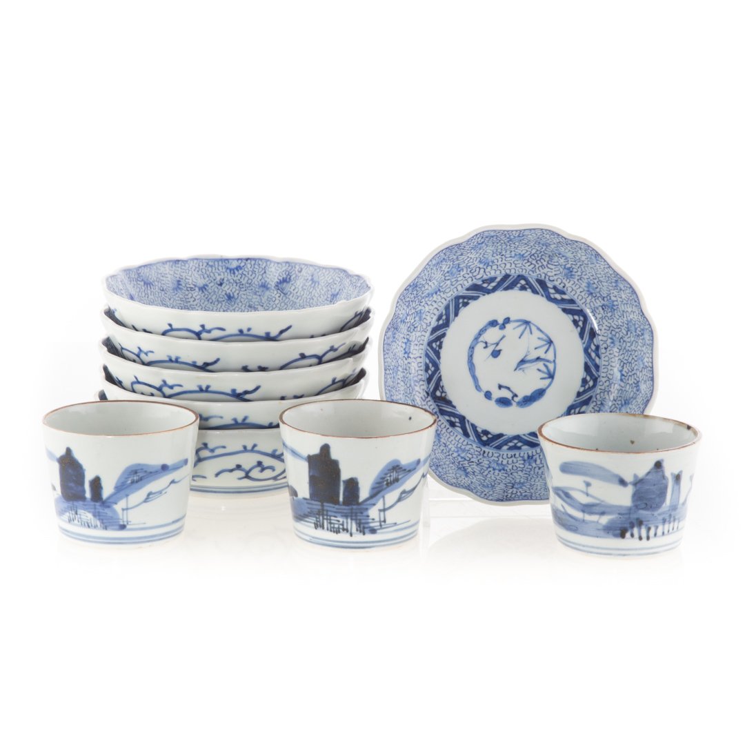Six Japanese Arita bowls and beaker cups: second half-19th century; bowls with seaweed and floral decoration, 5 3/4 in. Diam., and beakers with landscape decoration, 2 1/2 in. H.