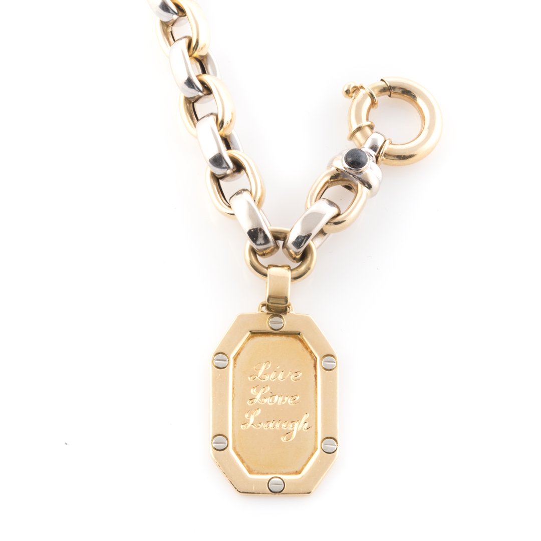 A Link Bracelet in 14K with an 18K Gold Charm (1 of 4)