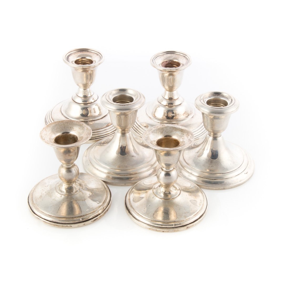 3 Pairs of weighted sterling low candlesticks (1 of 3)