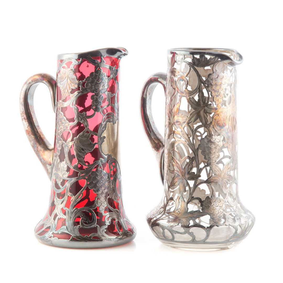 Two Victorian silver overlaid glass pitchers (1 of 3)
