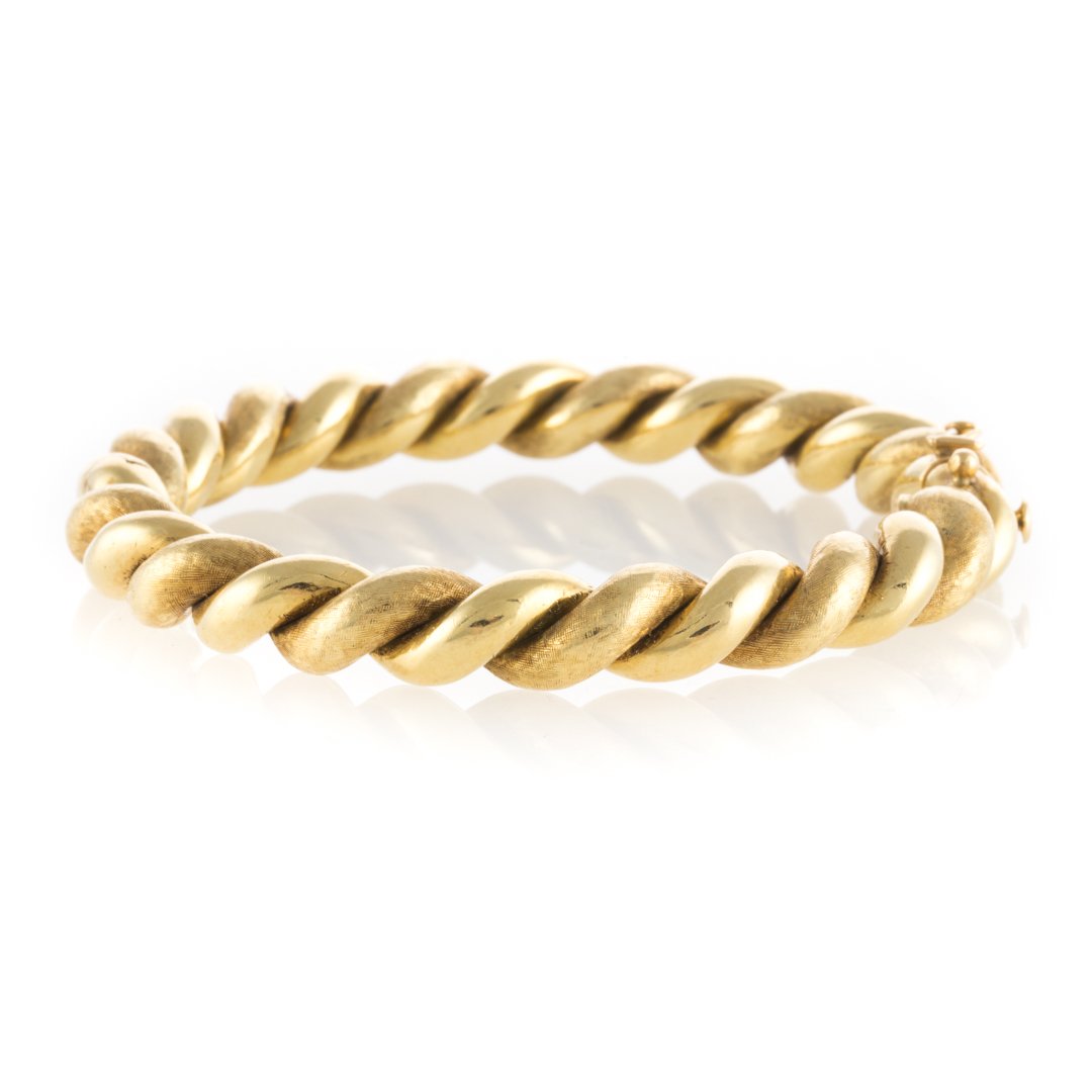 A Lady's 18K Twist bangle Bracelet (1 of 3)
