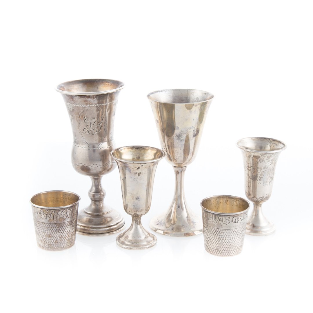Six sterling silver table articles: comprising: Stieff wine stem #802, Kiddush cup (monogrammed), pair of weighted cordials, and a pair of "Only a Thimble Full" jiggers; 8.05 ozt. t.w.