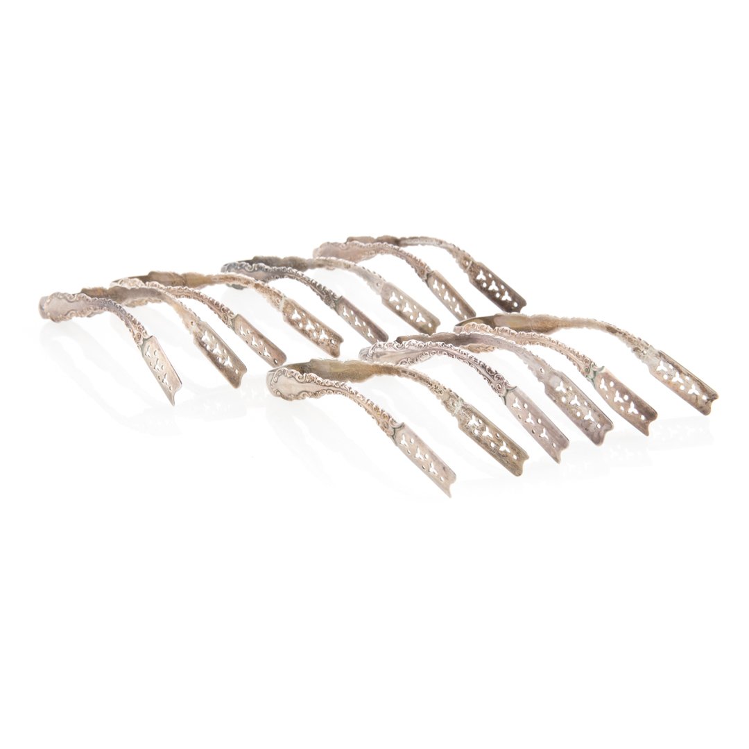 Set of 7 sterling individual asparagus tongs (1 of 3)