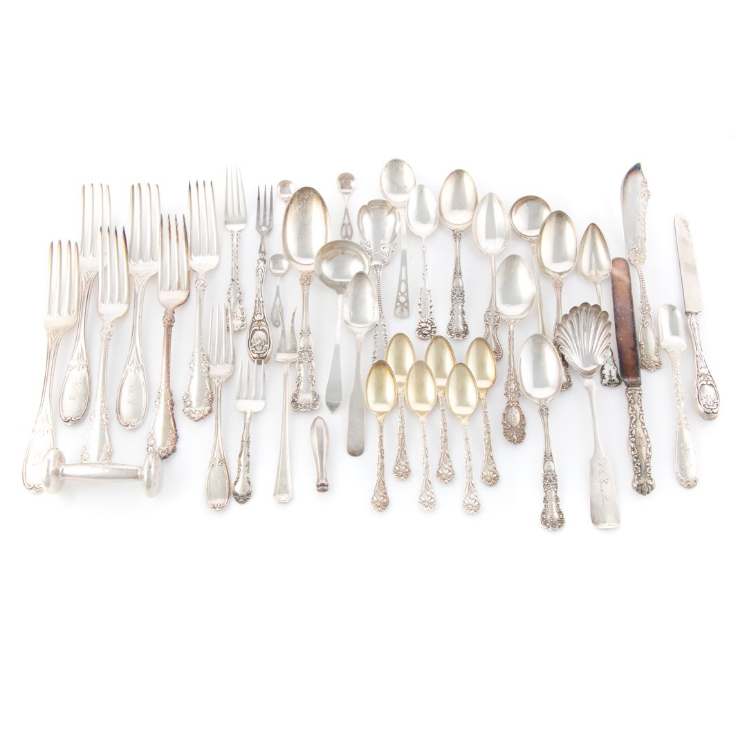 An assortment of sterling & coin silver flatware (1 of 6)