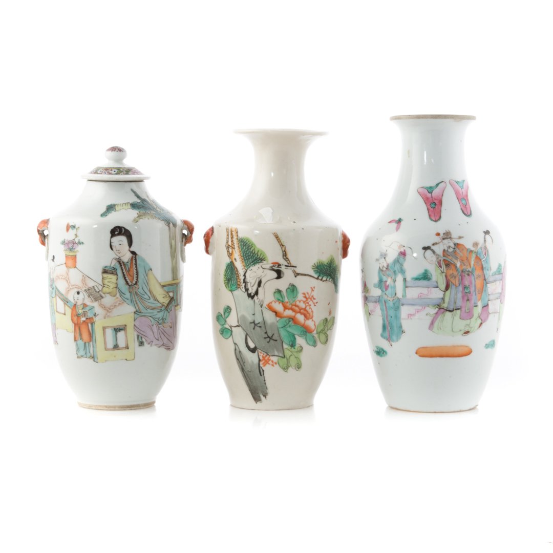 Three Chinese porcelain vases: including: Famille Verte vase with stork decoration, Famille Rose vase with archery lesson, and lidded vase with court scene decoration, 8 to 10 in. H.