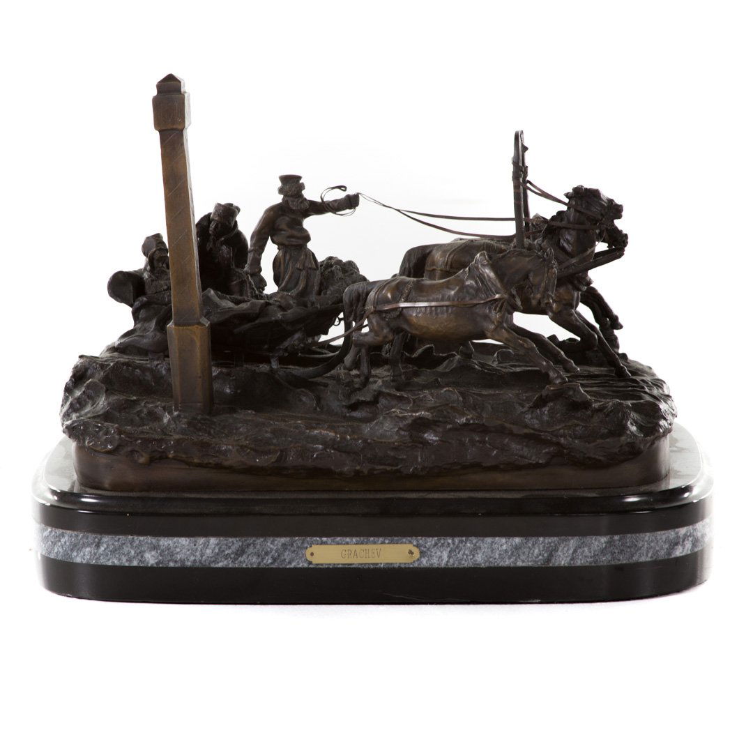 After Vassilli Grachev. Troika Ride bronze: mounted on marble base with brass title plaque, figure - 11 in. H., 16 in. L.