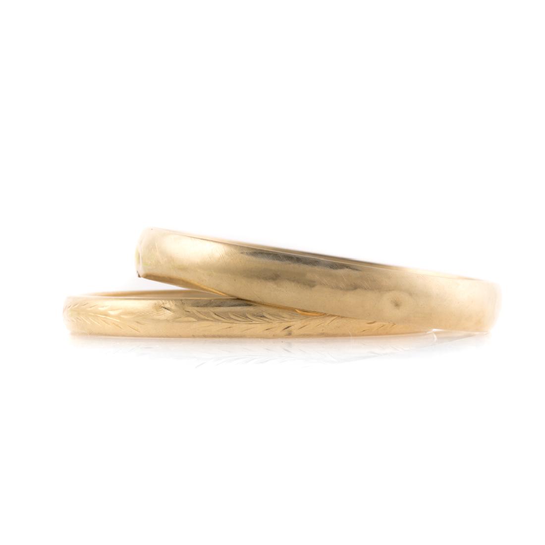 A Pair of 14K Yellow Gold Hinged Bangle Bracelets (1 of 4)
