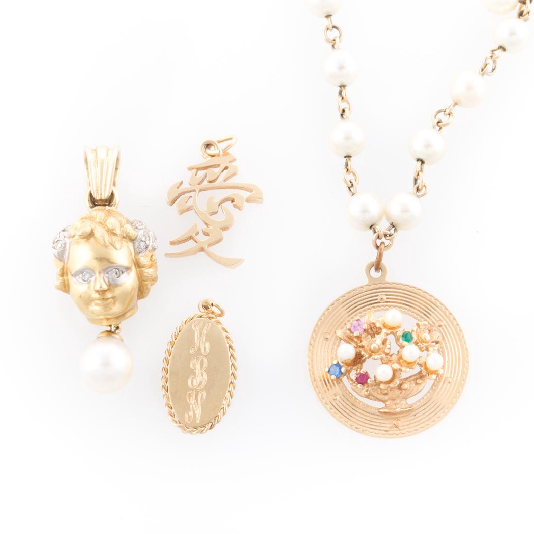 An Assortment of Pearl & Gold Jewelry (1 of 5)