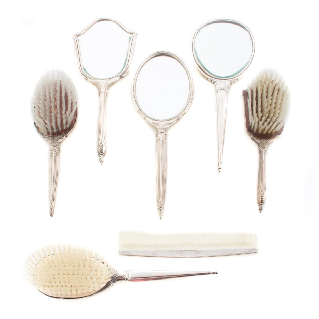 A trio of Victorian sterling silver vanity sets (1 of 8)