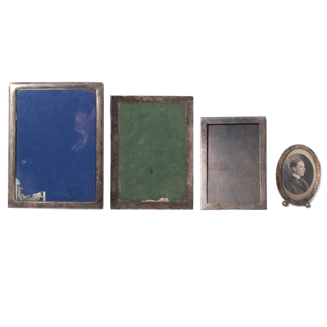 Four assorted sterling silver picture frames: comprising: 3 square frames, 10 x 7 1/2 in., 9 x 6 1/2 in., 7 3/4 x 5 1/2 in.; and an oval frame, 5 x 3 3/4 in.