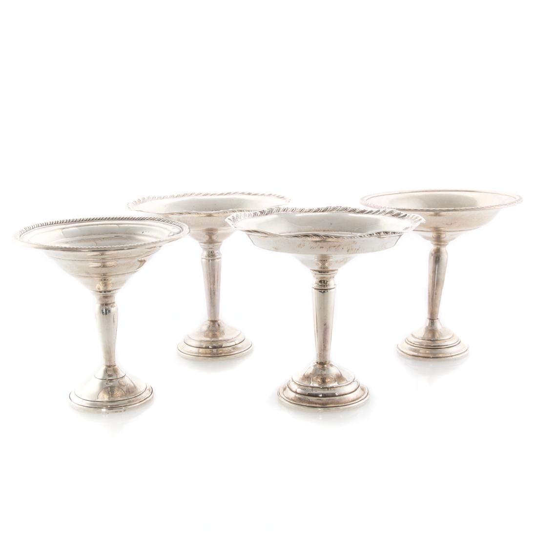 Four assorted weighted compotes: .