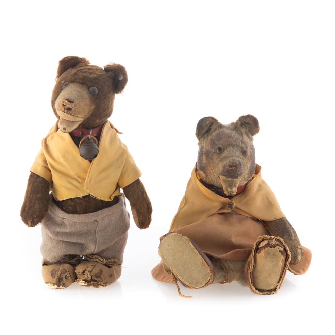Pair of Stieff boy and girl jointed bears: first quarter-20th century; boy bear dressed in pants and vest with red collar having bell and girl bear dressed in skirt and blouse with similar collar and leather shoes, both 8 1/2 in. H.