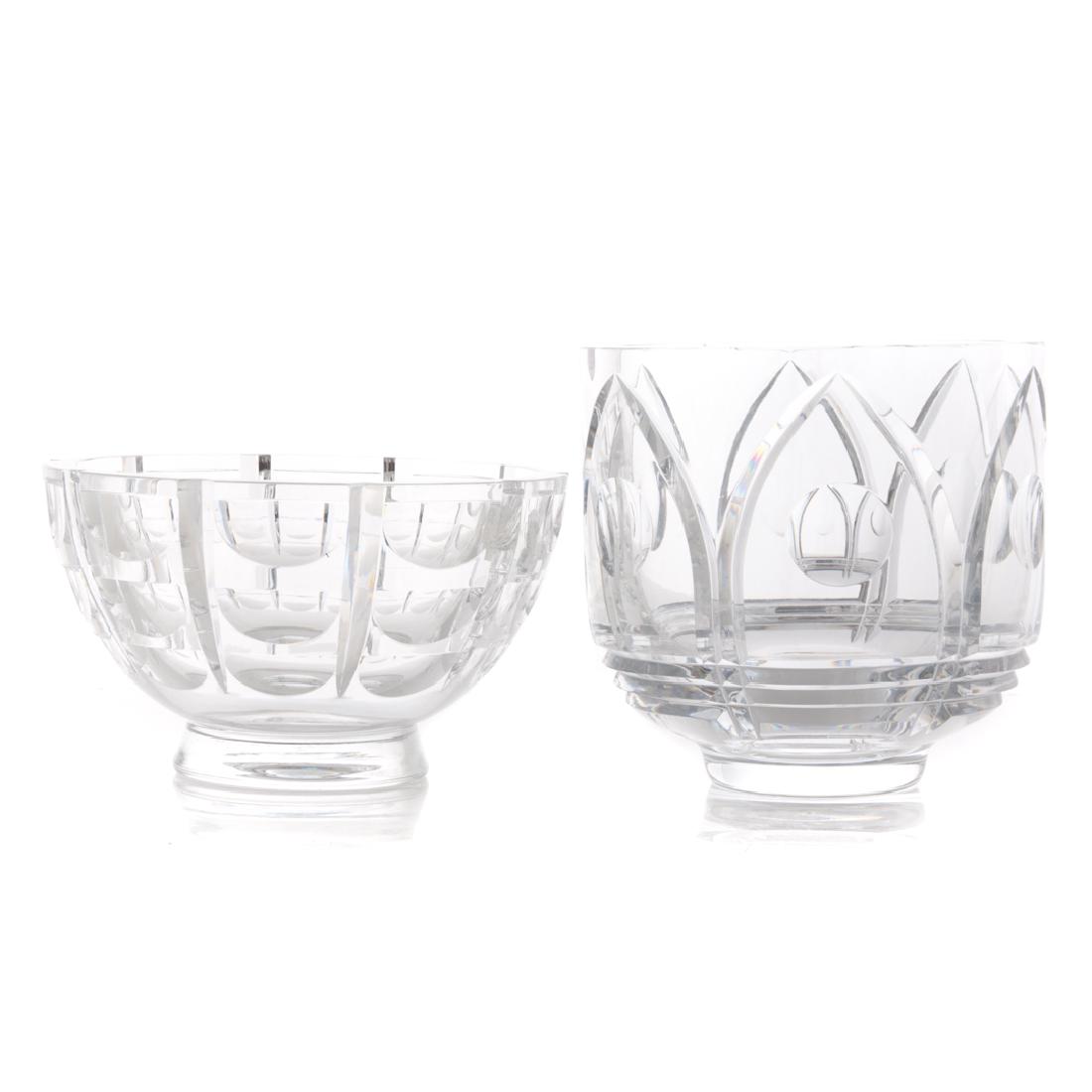 Two Orrefors crystal footed bowls: Including: faceted cut bowl, 6 in. H., 9 1/2 in. Diam., other with cut geometric pattern, 8 in. H., 8 in. Diam., both inscribed "Orrefors"