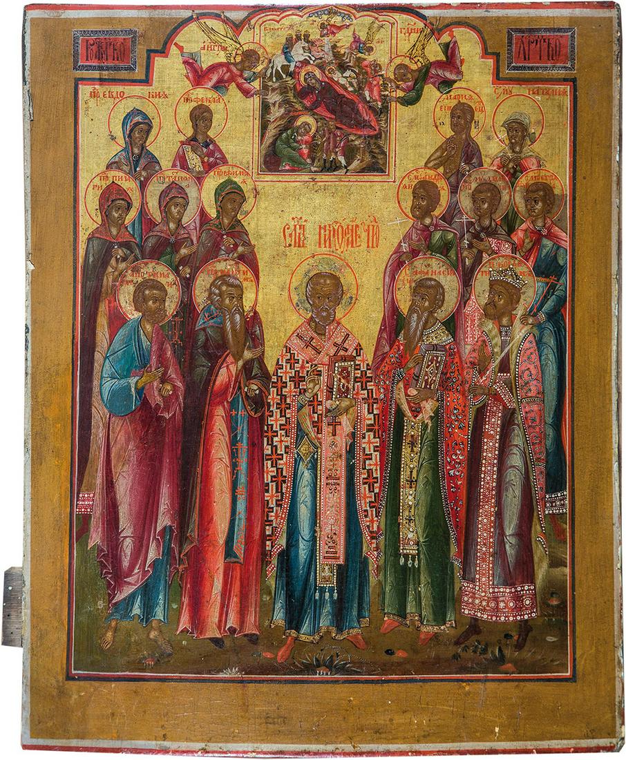 Großformatige Ikone mit der Geburt Christi und: Großformatige Ikone mit der Geburt Christi und ausgewählten Heiligen Russland, 19. Jh. Verbund aus zwei Holztafeln mit zwei profilierten Rückseiten-Sponki. Tempera auf Kreidegrund, Hintergrund verg