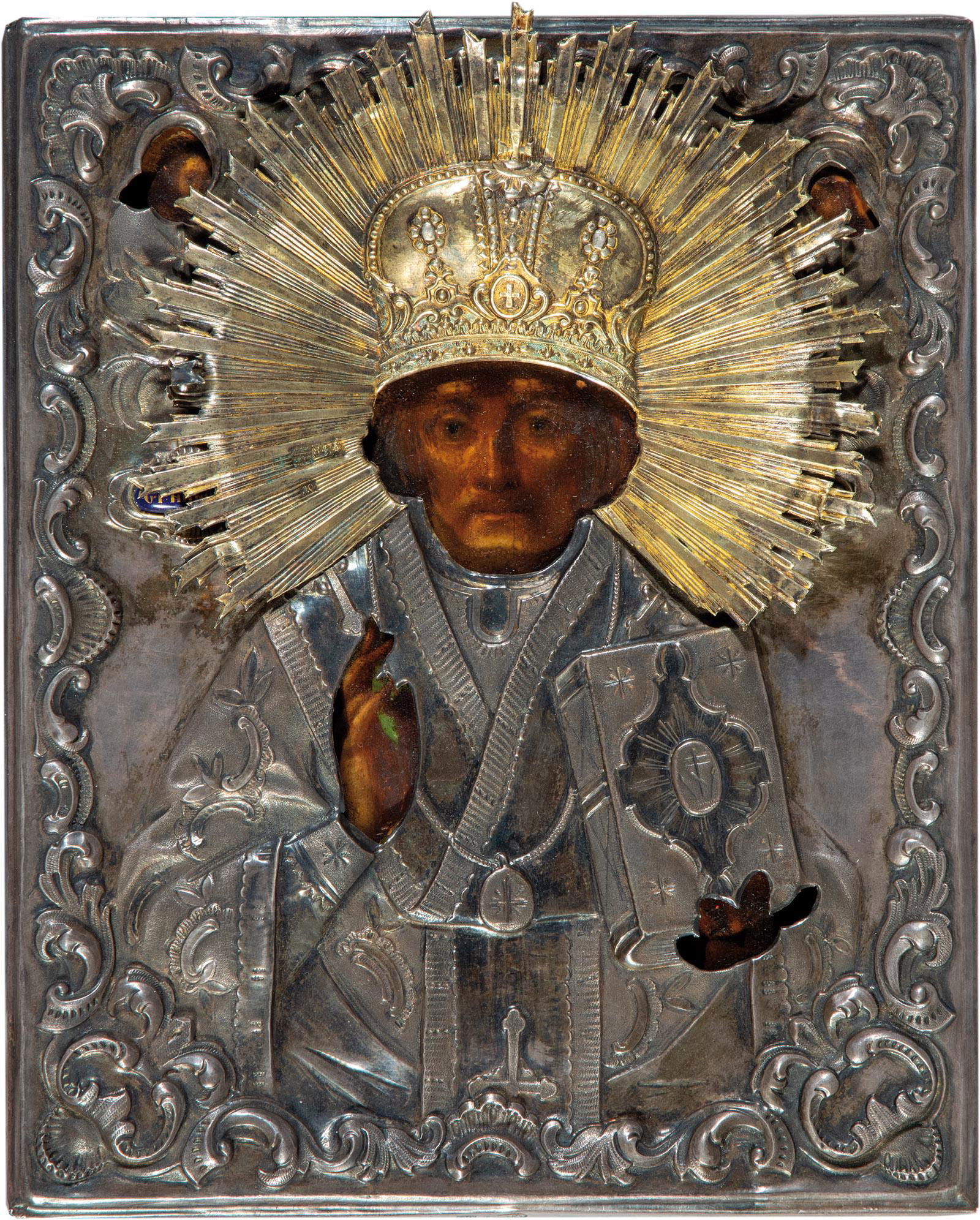 Heiliger Nikolaus von Myra mit Silberoklad: St. Nicholas of Myra with silver oklad. Russia, Moscow, late 19th century (icon) / Dmitry Orlov, 1863 (oklad). Oil on wood panel. Back covered. Embossed silver oklad and gilded halo stamped with hallm