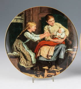Sammlerteller ''Das erste Lächeln'' aus einer Serie: Sammlerteller ''Das erste Lächeln'' aus einer Serie ''Ankers Erbe'' Langenthal, Schweiz, 1986 Feiner, polychromer Umdruckdekor nach einem Gemälde von Albert Anker aus dem Jahre 1885. Rand vergol