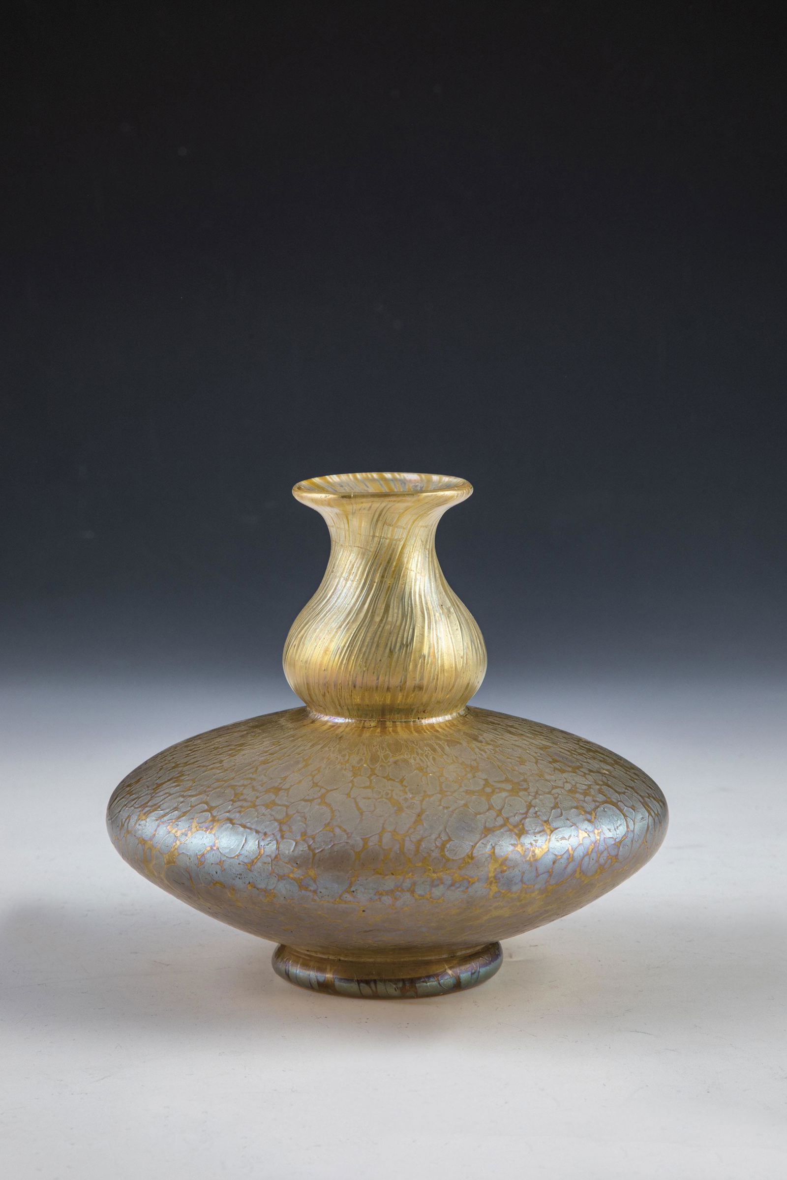 Vase ''Candia Papillon: Vase ''Candia Papillon'' Loetz Wwe., KlostermÃ¼hle, c. 1900 Colorless glass, with dense silver-yellow corolla enamel. Matt iridescent. 12 cm.