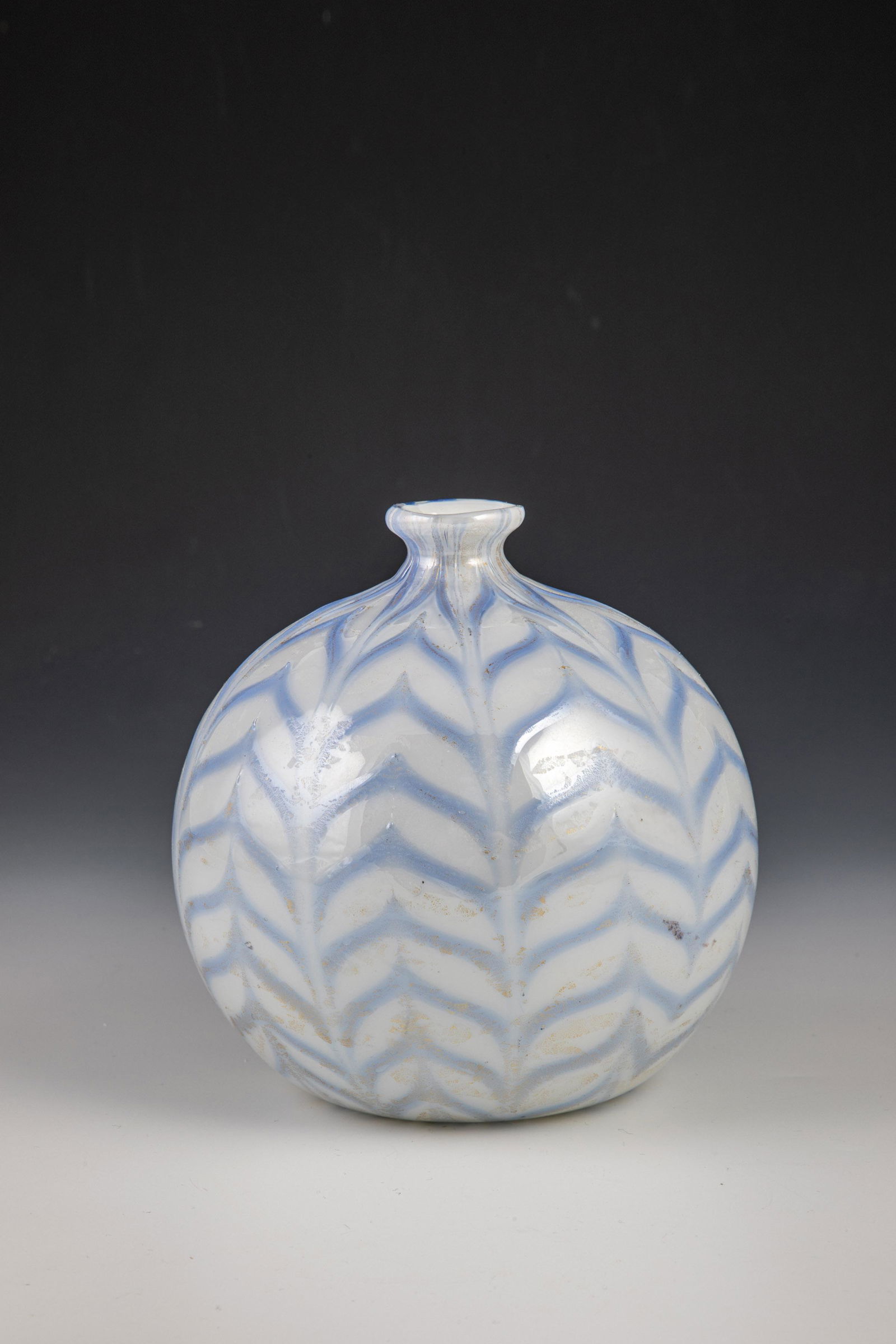 Rare spherical vase ''Fenicio'': Rare spherical vase ''Fenicio'' Carlo Scarpa (design), M.V.M. Cappellin & Co., Murano, 1928 - 1931 Colorless glass, milky white underlay, with light blue, wavy combed thread enamel, overlaid with fine