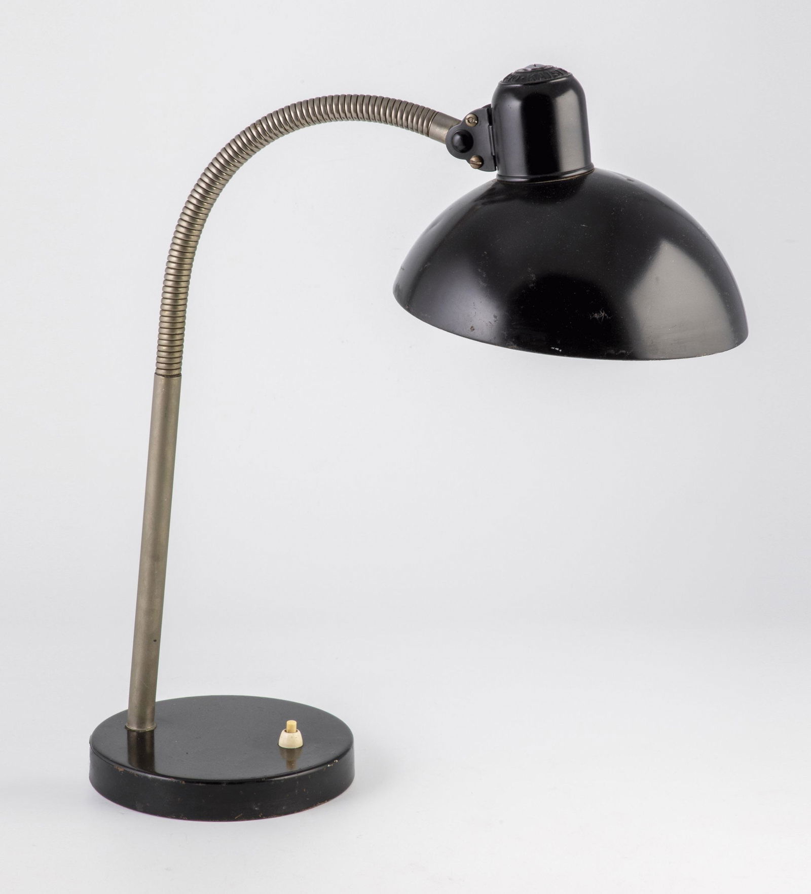 Table lamp: Table lamp original Kaiser Idell, 1950/60s. Model 6561 gooseneck, design Christian Dell. Marked: ''Original Kaiser Idell''. Metal, stand and shade painted black, lamp arm flexible. H. ca. 60 cm, d. 16