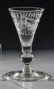 Funnel Cup: Funnel goblet Bohemia, around 1700 Disc base with downturned rim and demolition. On cupola surrounding matte-cut decoration: bird between flowering branches and leaf borders. H. 14,5 cm