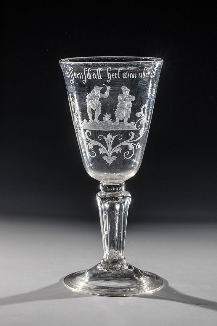 Cup: Goblet Thurinia or AltenmÃ¼ndener HÃ¼tte, 18th Century. Cap foot with break-off and polished rim. Depiction of two musicians above inscription "unsseren Schall hert man Ã¼ber all". H 22,7 cm