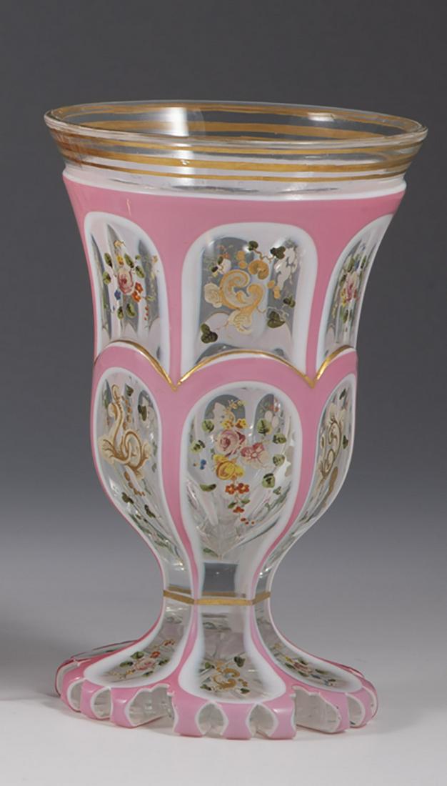 Foot cup with floral decoration: Foot cup with floral decoration Bohemia, around 1840 Colorless glass with double overlay in white and pink, ornamentally cut through. Decorated in polychrome enamel painting and gold: floral arrangeme
